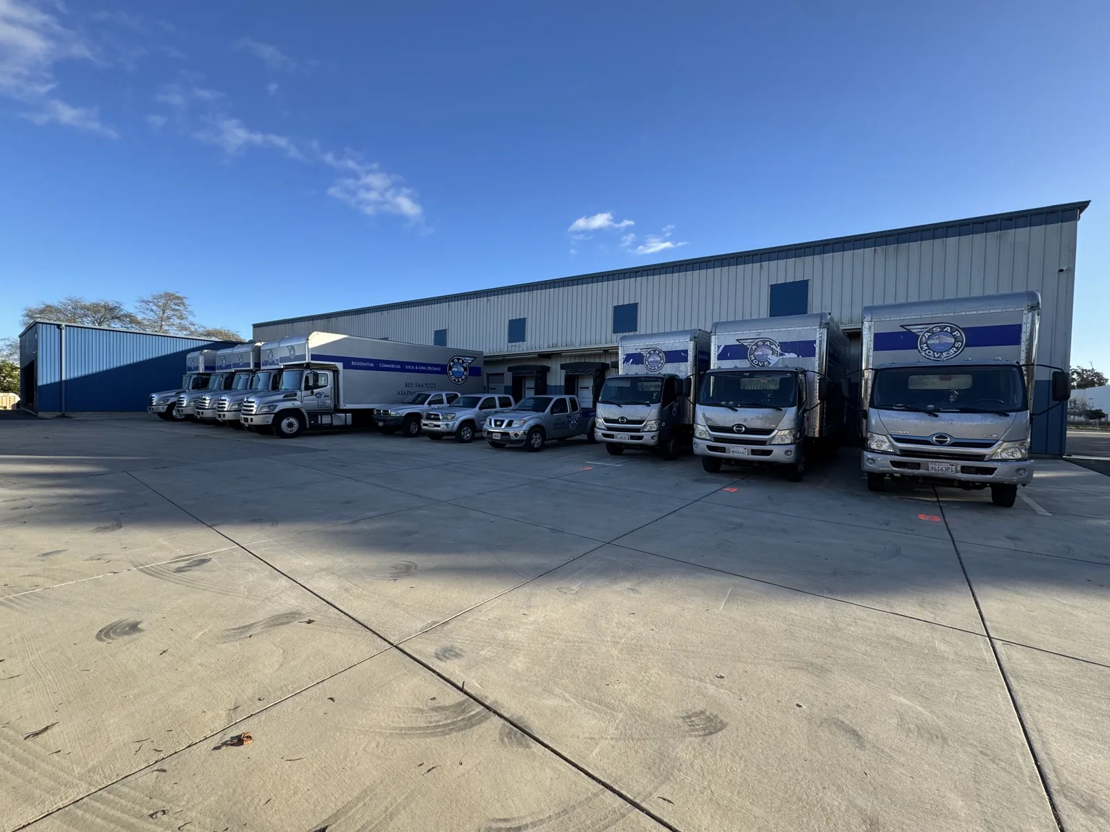 ASAP Movers delivery fleet at the warehouse facility