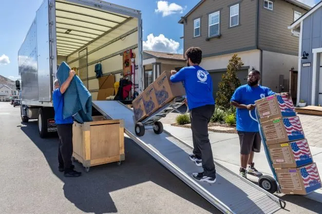 ASAP Movers crew loading furniture and boxes
