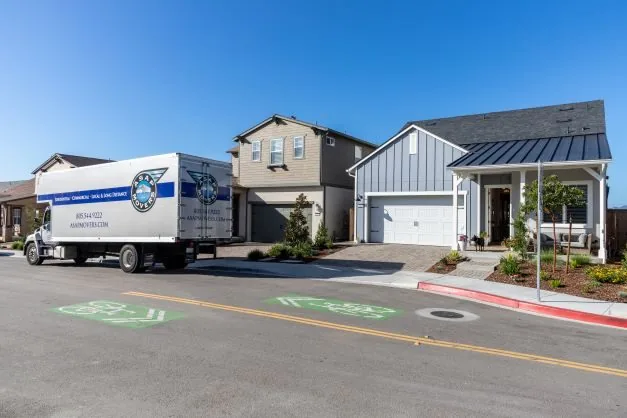 ASAP Movers truck at a local home